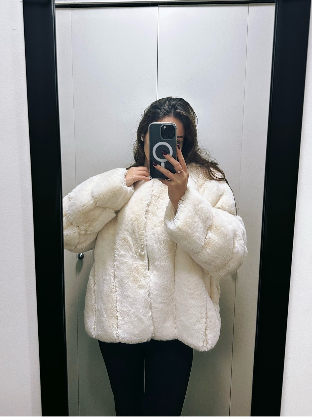 White faux fur coat